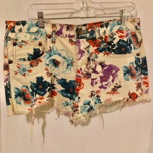 Floral printed distressed denim shorts